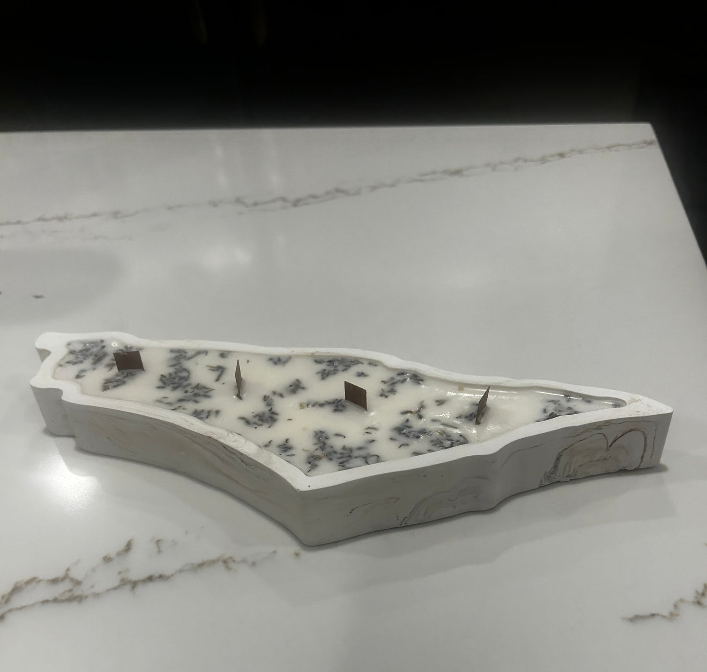 Candle shaped like the map of Israel