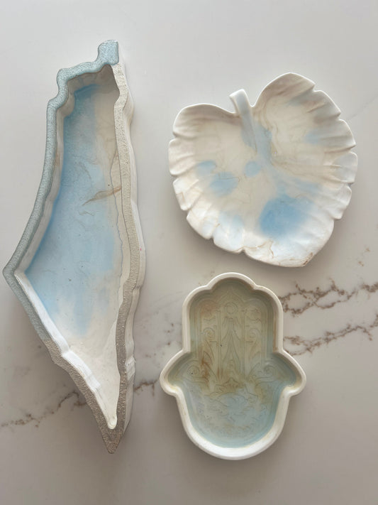 Tray designs inspired by the Map of Israel, Hamsa & Leaf