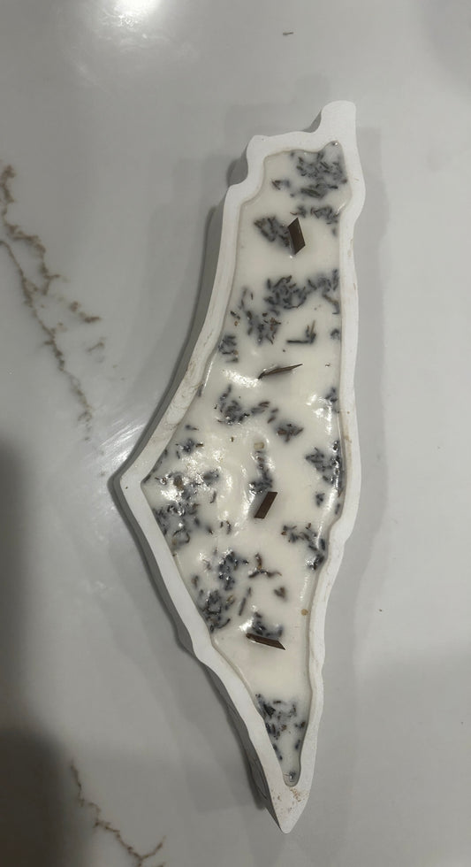 Candle shaped like the map of Israel