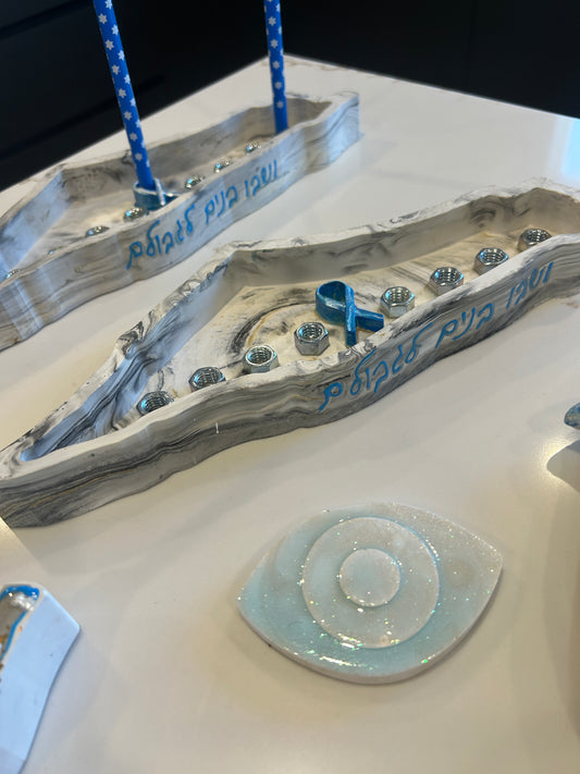 Chanukkah gray Menorah in the shape of Israel