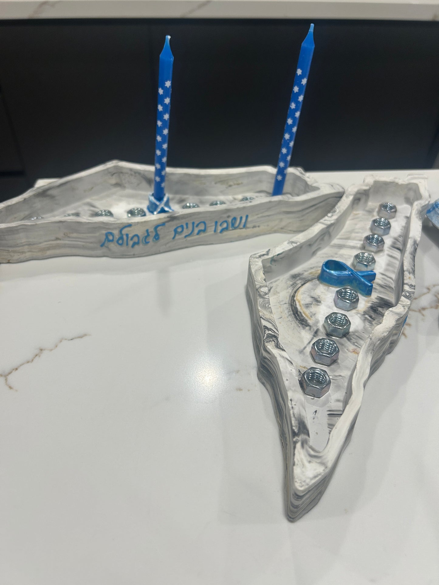 Chanukkah gray Menorah in the shape of Israel